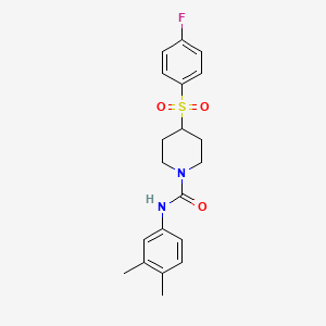 molecular formula C20H23FN2O3S B2423616 N-(3,4-二甲基苯基)-4-((4-氟苯基)磺酰基)哌啶-1-甲酰胺 CAS No. 1798029-79-4