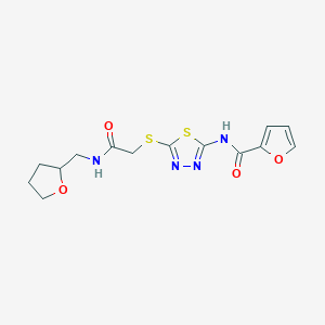 molecular formula C14H16N4O4S2 B2425012 N-(5-((2-oxo-2-(((四氢呋喃-2-基)甲基)氨基)乙基)硫代)-1,3,4-噻二唑-2-基)呋喃-2-甲酰胺 CAS No. 868976-80-1