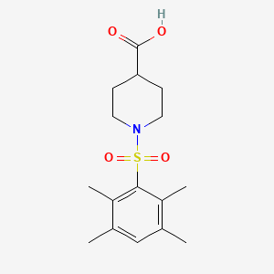 1-(2,3,5,6-Tetramethylbenzenesulfonyl)piperidine-4-carboxylic acid
