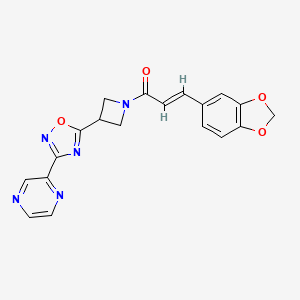 molecular formula C19H15N5O4 B2425939 (E)-3-(benzo[d][1,3]dioxol-5-yl)-1-(3-(3-(pyrazin-2-yl)-1,2,4-oxadiazol-5-yl)azetidin-1-yl)prop-2-en-1-one CAS No. 1331426-37-9