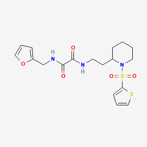 molecular formula C18H23N3O5S2 B2427014 N1-(呋喃-2-基甲基)-N2-(2-(1-(噻吩-2-基磺酰基)哌啶-2-基)乙基)草酰胺 CAS No. 887861-12-3