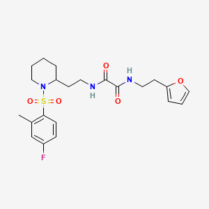 molecular formula C22H28FN3O5S B2427345 N1-(2-(1-((4-氟-2-甲苯磺酰)哌啶-2-基)乙基)-N2-(2-(呋喃-2-基)乙基)草酰胺 CAS No. 898407-32-4