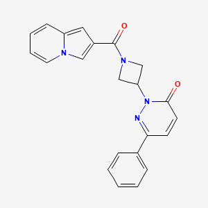 molecular formula C22H18N4O2 B2427658 2-[1-(Indolizine-2-carbonyl)azetidin-3-yl]-6-phenylpyridazin-3-one CAS No. 2380185-58-8