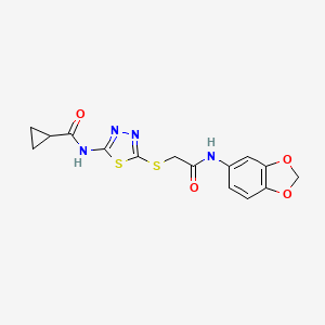 molecular formula C15H14N4O4S2 B2428416 N-[5-[2-(1,3-benzodioxol-5-ylamino)-2-oxoethyl]sulfanyl-1,3,4-thiadiazol-2-yl]cyclopropanecarboxamide CAS No. 868975-03-5