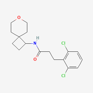 3-(2,6-dichlorophenyl)-N-{7-oxaspiro[3.5]nonan-1-yl}propanamide