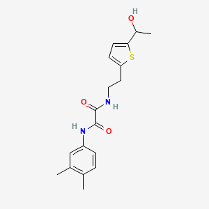 molecular formula C18H22N2O3S B2431071 N1-(3,4-dimethylphenyl)-N2-(2-(5-(1-hydroxyethyl)thiophen-2-yl)ethyl)oxalamide CAS No. 2034599-49-8