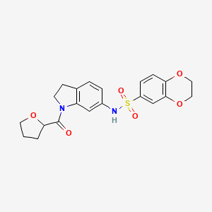 molecular formula C21H22N2O6S B2431364 N-(1-(tetrahydrofuran-2-carbonyl)indolin-6-yl)-2,3-dihydrobenzo[b][1,4]dioxine-6-sulfonamide CAS No. 1040637-03-3