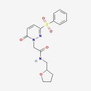 molecular formula C17H19N3O5S B2431501 2-[6-oxo-3-(phenylsulfonyl)pyridazin-1(6H)-yl]-N-(tetrahydrofuran-2-ylmethyl)acetamide CAS No. 1251673-60-5