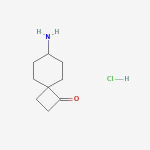 molecular formula C9H16ClNO B2432241 7-氨基螺[3.5]壬烷-3-酮；盐酸盐 CAS No. 2551115-31-0