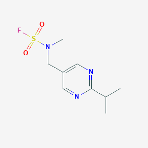 molecular formula C9H14FN3O2S B2433180 N-Methyl-N-[(2-propan-2-ylpyrimidin-5-yl)methyl]sulfamoyl fluoride CAS No. 2411278-73-2