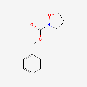 molecular formula C11H13NO3 B2433762 O=C(OCc1ccccc1)N1CCCO1 CAS No. 1880157-67-4