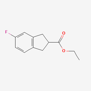 molecular formula C12H13FO2 B2433961 5-氟-2,3-二氢-1H-茚满-2-羧酸乙酯 CAS No. 1823383-20-5