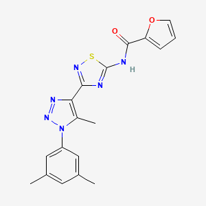 molecular formula C18H16N6O2S B2434850 N-{3-[1-(3,5-diméthylphényl)-5-méthyl-1H-1,2,3-triazol-4-yl]-1,2,4-thiadiazol-5-yl}furan-2-carboxamide CAS No. 931335-16-9