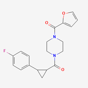 molecular formula C19H19FN2O3 B2434940 (4-(2-(4-Fluorophenyl)cyclopropanecarbonyl)piperazin-1-yl)(furan-2-yl)methanone CAS No. 1208518-98-2