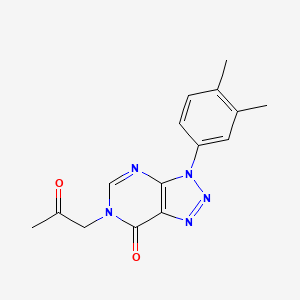 molecular formula C15H15N5O2 B2436083 3-(3,4-Dimethylphenyl)-6-(2-oxopropyl)triazolo[4,5-d]pyrimidin-7-one CAS No. 893920-04-2