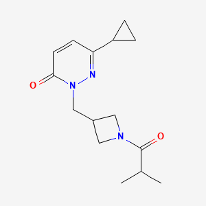 molecular formula C15H21N3O2 B2436262 6-Cyclopropyl-2-[[1-(2-methylpropanoyl)azetidin-3-yl]methyl]pyridazin-3-one CAS No. 2320143-86-8