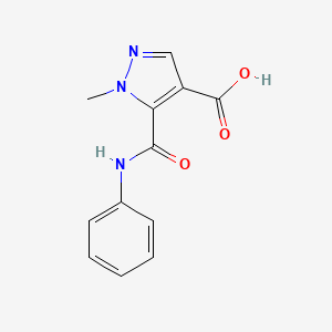 molecular formula C12H11N3O3 B2436269 5-(anilinocarbonyl)-1-methyl-1H-pyrazole-4-carboxylic acid CAS No. 1052627-11-8