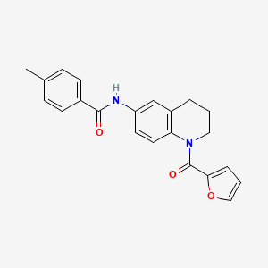 molecular formula C22H20N2O3 B2437571 N-[1-(2-furoyl)-1,2,3,4-tetrahydroquinolin-6-yl]-4-methylbenzamide CAS No. 946289-06-1