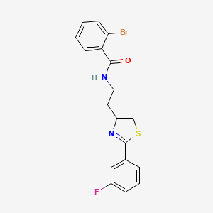 B2439628 2-bromo-N-[2-[2-(3-fluorophenyl)-1,3-thiazol-4-yl]ethyl]benzamide CAS No. 932987-18-3
