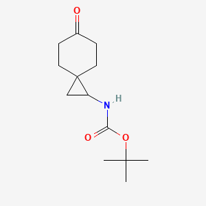 molecular formula C13H21NO3 B2440273 tert-butyl N-{6-oxospiro[2.5]octan-1-yl}carbamate CAS No. 1784627-63-9