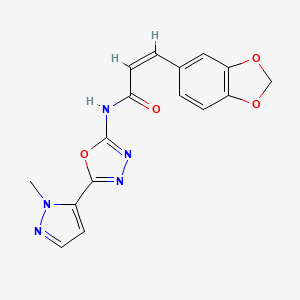 molecular formula C16H13N5O4 B2440335 (Z)-3-(苯并[d][1,3]二氧杂环-5-基)-N-(5-(1-甲基-1H-吡唑-5-基)-1,3,4-恶二唑-2-基)丙烯酰胺 CAS No. 1173317-06-0