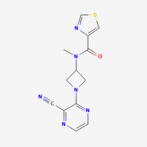molecular formula C13H12N6OS B2440602 N-[1-(3-Cyanopyrazin-2-yl)azetidin-3-yl]-N-methyl-1,3-thiazole-4-carboxamide CAS No. 2380140-75-8