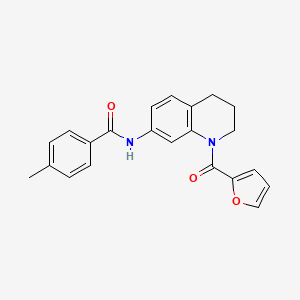 molecular formula C22H20N2O3 B2441500 N-[1-(2-furoyl)-1,2,3,4-tetrahydroquinolin-7-yl]-4-methylbenzamide CAS No. 946265-80-1