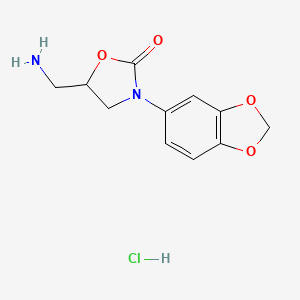 molecular formula C11H13ClN2O4 B2442914 盐酸5-(氨甲基)-3-(苯并[d][1,3]二氧杂环-5-基)恶唑烷-2-酮 CAS No. 2034469-89-9