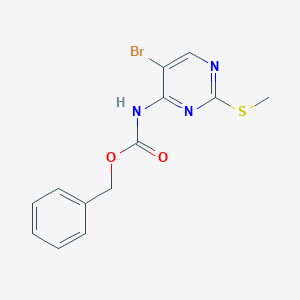 molecular formula C13H12BrN3O2S B2443157 苯甲酸（5-溴-2-（甲硫基）嘧啶-4-基）氨基甲酸酯 CAS No. 1820664-83-2