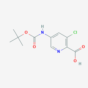 molecular formula C11H13ClN2O4 B2443509 Ácido 3-cloro-5-[(2-metilpropan-2-il)oxicarbonilamino]piridina-2-carboxílico CAS No. 2097854-25-4