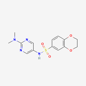 molecular formula C14H16N4O4S B2444111 N-(2-(dimethylamino)pyrimidin-5-yl)-2,3-dihydrobenzo[b][1,4]dioxine-6-sulfonamide CAS No. 1396633-72-9
