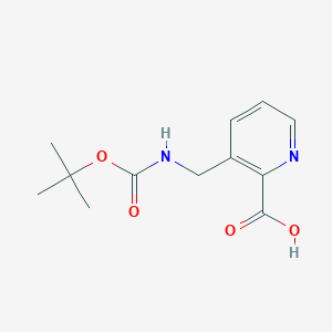 molecular formula C12H16N2O4 B2444814 3-[[(2-Methylpropan-2-yl)oxycarbonylamino]methyl]pyridine-2-carboxylic acid CAS No. 903094-64-4
