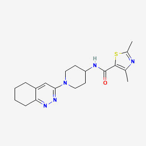B2444980 2,4-dimethyl-N-(1-(5,6,7,8-tetrahydrocinnolin-3-yl)piperidin-4-yl)thiazole-5-carboxamide CAS No. 2034319-20-3