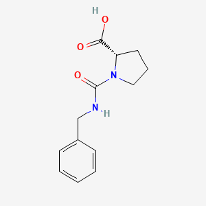 molecular formula C13H16N2O3 B2445422 (2S)-1-(benzylcarbamoyl)pyrrolidine-2-carboxylic acid CAS No. 162204-10-6