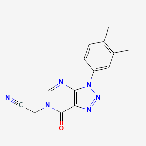 molecular formula C14H12N6O B2446138 2-[3-(3,4-Dimethylphenyl)-7-oxotriazolo[4,5-d]pyrimidin-6-yl]acetonitrile CAS No. 872591-19-0