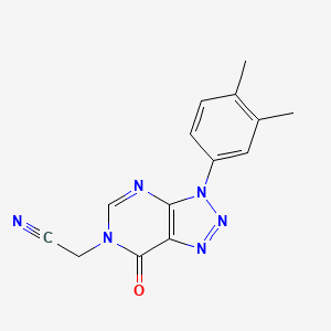 B2446138 2-[3-(3,4-Dimethylphenyl)-7-oxotriazolo[4,5-d]pyrimidin-6-yl]acetonitrile CAS No. 872591-19-0