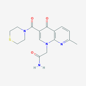 2-(7-methyl-4-oxo-3-(thiomorpholine-4-carbonyl)-1,8-naphthyridin-1(4H)-yl)acetamide