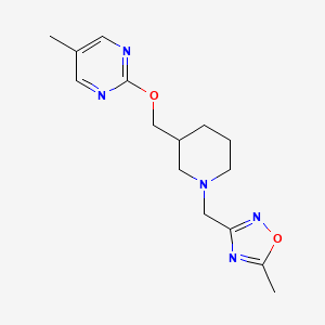 molecular formula C15H21N5O2 B2448014 5-Methyl-3-[[3-[(5-methylpyrimidin-2-yl)oxymethyl]piperidin-1-yl]methyl]-1,2,4-oxadiazole CAS No. 2379984-24-2