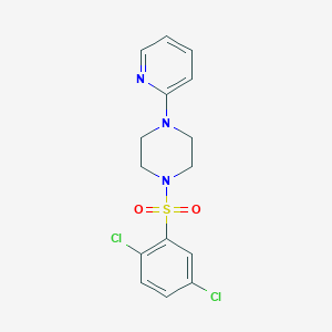 molecular formula C15H15Cl2N3O2S B2448314 1,4-Dichloro-2-((4-(2-pyridyl)piperazinyl)sulfonyl)benzene CAS No. 335282-91-2