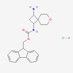 molecular formula C23H27ClN2O3 B2448952 9H-芴-9-基甲基 N-(1-氨基-7-氧代螺[3.5]壬-3-基)氨基甲酸酯；盐酸盐 CAS No. 2580220-87-5