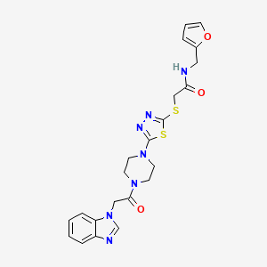 molecular formula C22H23N7O3S2 B2449156 2-((5-(4-(2-(1H-苯并[d]咪唑-1-基)乙酰)哌嗪-1-基)-1,3,4-噻二唑-2-基)硫代)-N-(呋喃-2-基甲基)乙酰胺 CAS No. 1207029-74-0