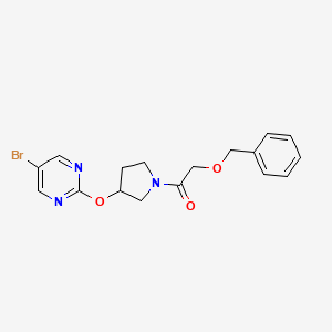 molecular formula C17H18BrN3O3 B2449183 2-(Benzyloxy)-1-{3-[(5-bromopyrimidin-2-yl)oxy]pyrrolidin-1-yl}ethan-1-one CAS No. 2097932-15-3