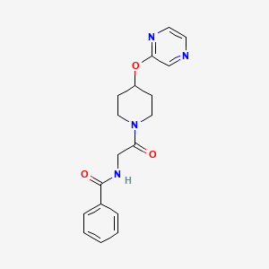 molecular formula C18H20N4O3 B2449687 N-(2-oxo-2-(4-(pyrazin-2-yloxy)piperidin-1-yl)ethyl)benzamide CAS No. 1448078-84-9