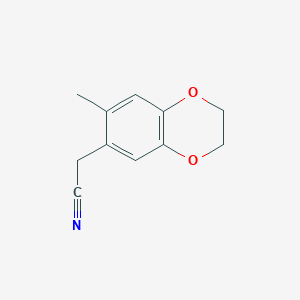 B2450229 2-(7-Methyl-2,3-dihydro-1,4-benzodioxin-6-yl)acetonitrile CAS No. 183995-29-1