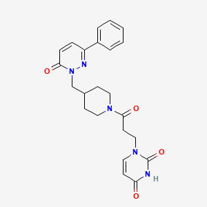 molecular formula C23H25N5O4 B2450657 1-(3-氧代-3-{4-[(6-氧代-3-苯基-1,6-二氢哒嗪-1-基)甲基]哌啶-1-基}丙基)-1,2,3,4-四氢嘧啶-2,4-二酮 CAS No. 2097899-40-4