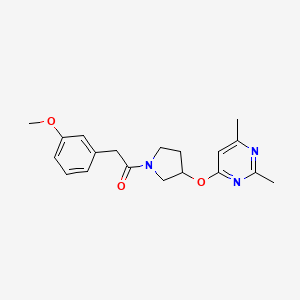 molecular formula C19H23N3O3 B2450932 1-{3-[(2,6-Dimethylpyrimidin-4-yl)oxy]pyrrolidin-1-yl}-2-(3-methoxyphenyl)ethan-1-one CAS No. 2097910-07-9