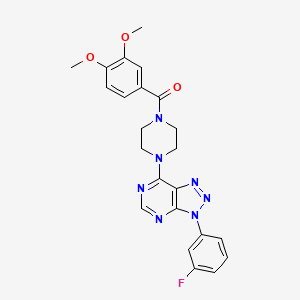molecular formula C23H22FN7O3 B2452988 (3,4-二甲氧基苯基)(4-(3-(3-氟苯基)-3H-[1,2,3]三唑并[4,5-d]嘧啶-7-基)哌嗪-1-基)甲酮 CAS No. 920367-17-5