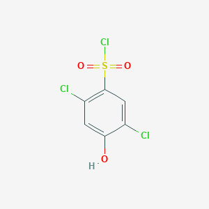 molecular formula C6H3Cl3O3S B2453221 2,5-Dichloro-4-hydroxybenzene-1-sulfonyl chloride CAS No. 71292-90-5