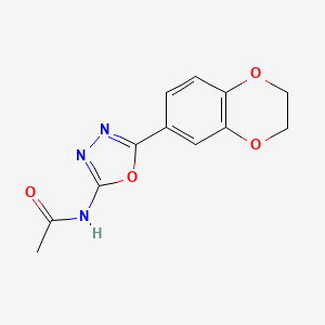 molecular formula C12H11N3O4 B2454561 N-(5-(2,3-dihydrobenzo[b][1,4]dioxin-6-yl)-1,3,4-oxadiazol-2-yl)acetamide CAS No. 851094-41-2