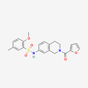 molecular formula C22H22N2O5S B2454577 N-(2-(furan-2-carbonyl)-1,2,3,4-tetrahydroisoquinolin-7-yl)-2-methoxy-5-methylbenzenesulfonamide CAS No. 955776-66-6
